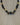 NECKLACE GOLD/BLACK GRADIANT BEAD