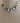 NECKLACE GREY FINGERNAIL BIB